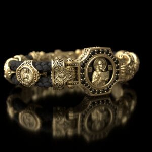Золотий православний браслет з оніксом та чорним камінням