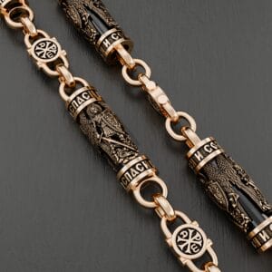 Золотий ланцюжок з Архангелом Михайло та чорним Оніксом.