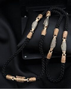 Шовковий шнурок із золотими вставками